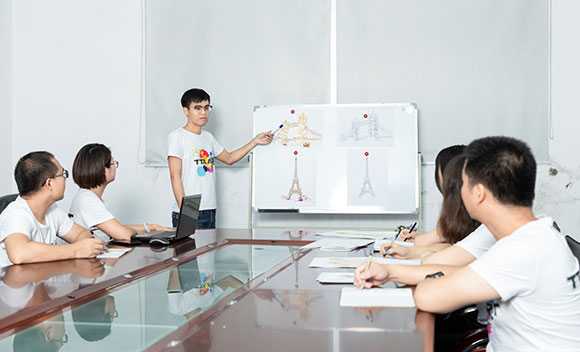 R&D team is having meeting discussing the new trend.